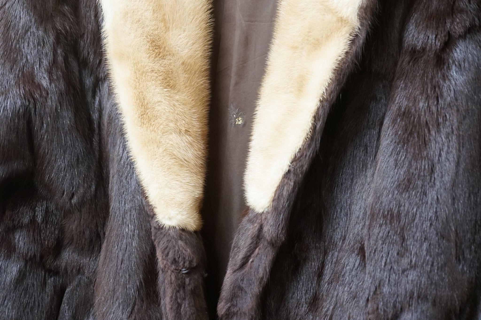 A ladies dark brown squirrel coat with blond mink collar by Baray Furs.